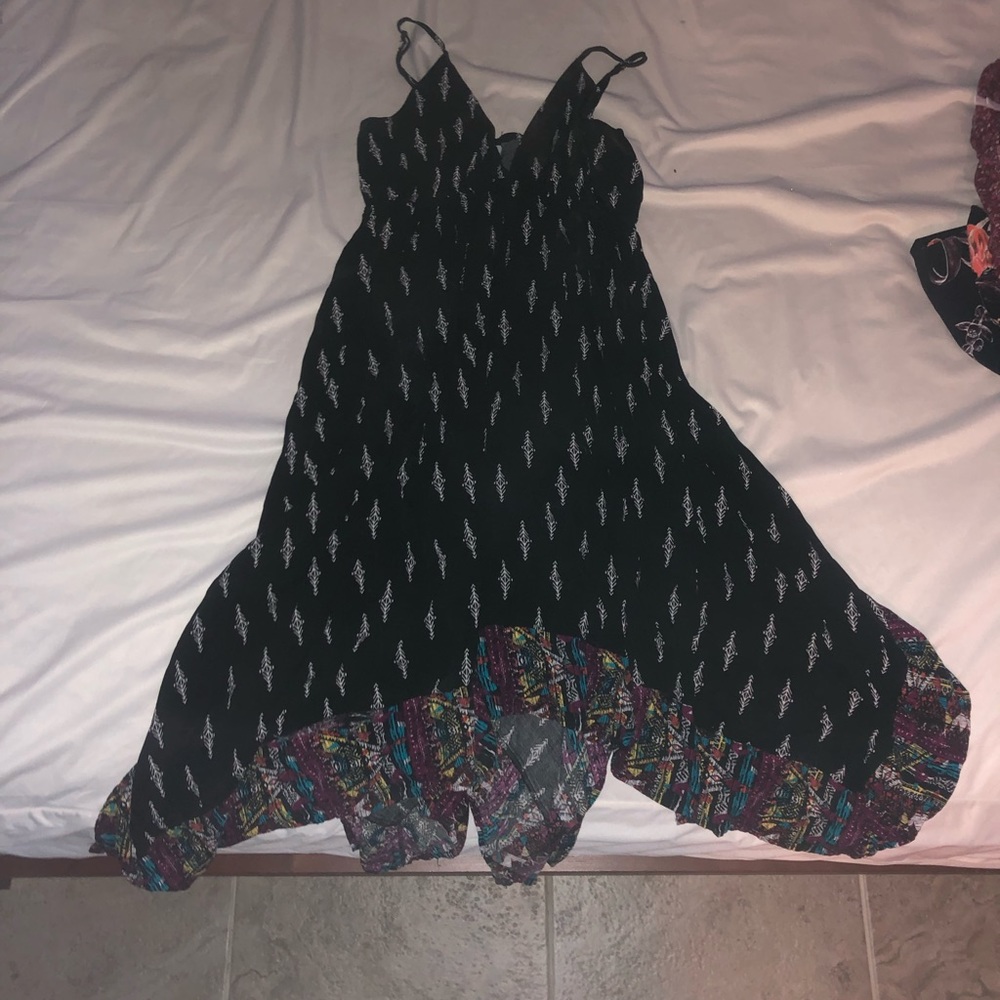 Handkerchief hem black dress with a pop of color!